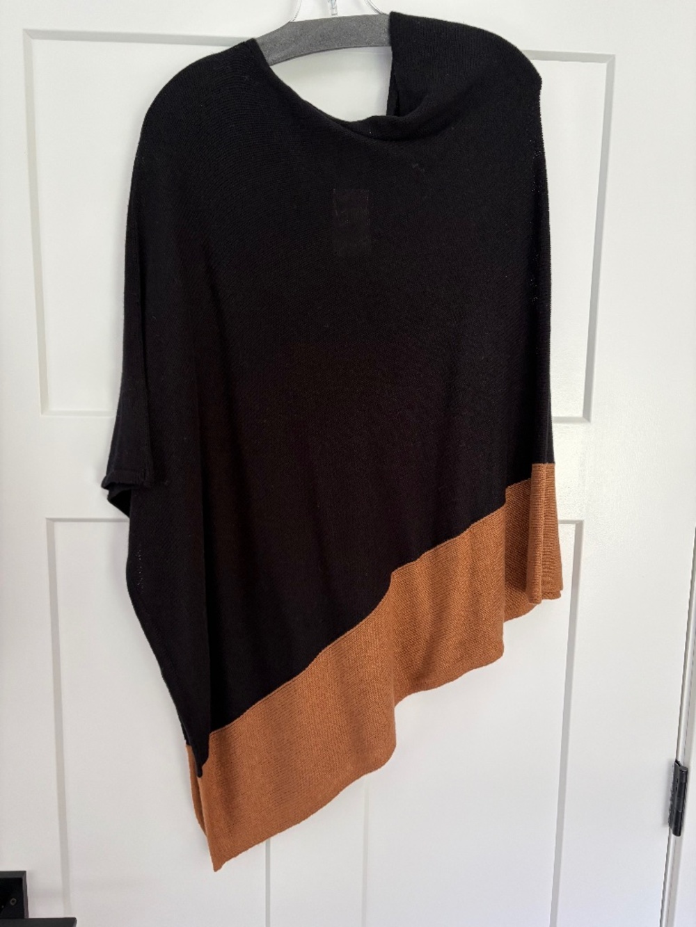 Asymmetrical sweater cape